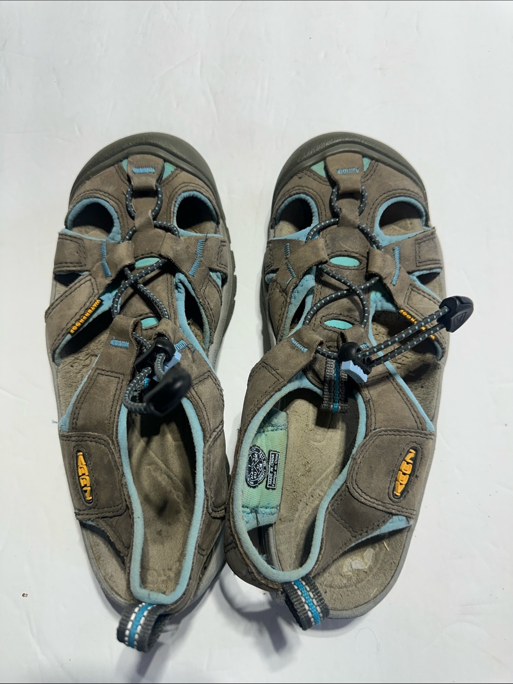 Keen Olive tan Outdoor Sandals with Light Blue Accents adjustable bungee strap
